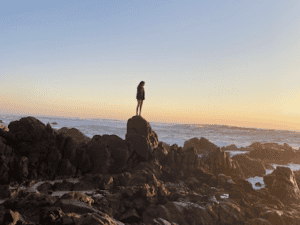 Sequoia Friedman on the California coast at sunset